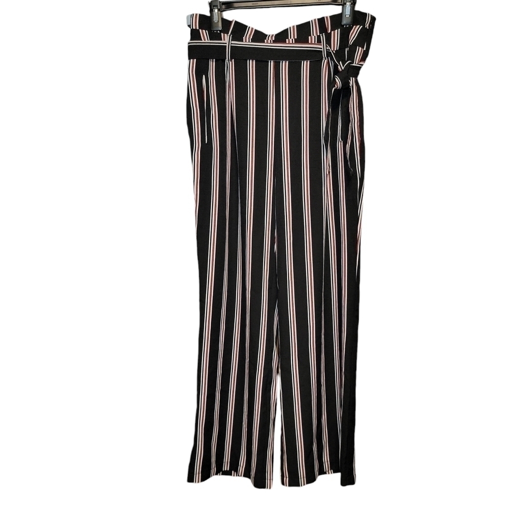 Cisono size large trousers. Black, white, & red. Zips on side, has pockets